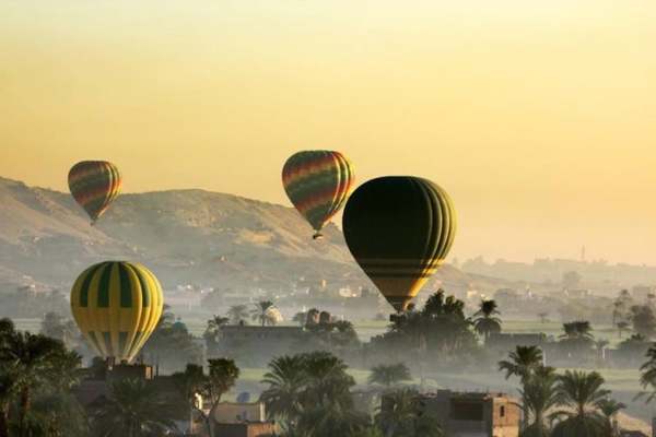 hot air balloons at dawn