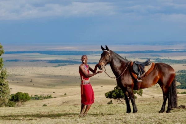 Masai Man with horses in the Masai Mara