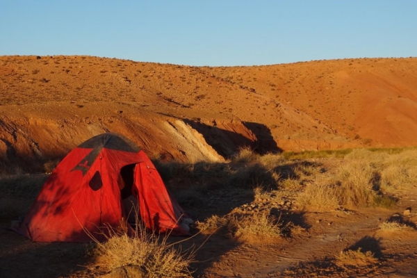 Red dome tent in the desert