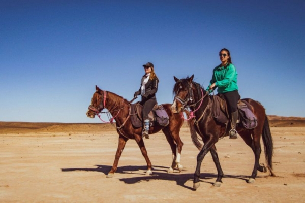 Horse riding in Sahara desert