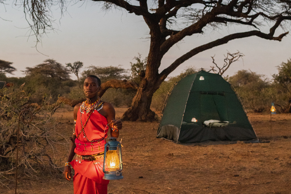Maasai safari guide at camp in Kenya