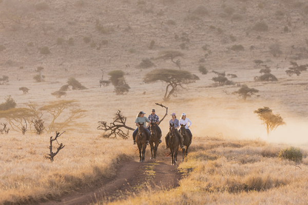 A group riding on a safari in Kenya