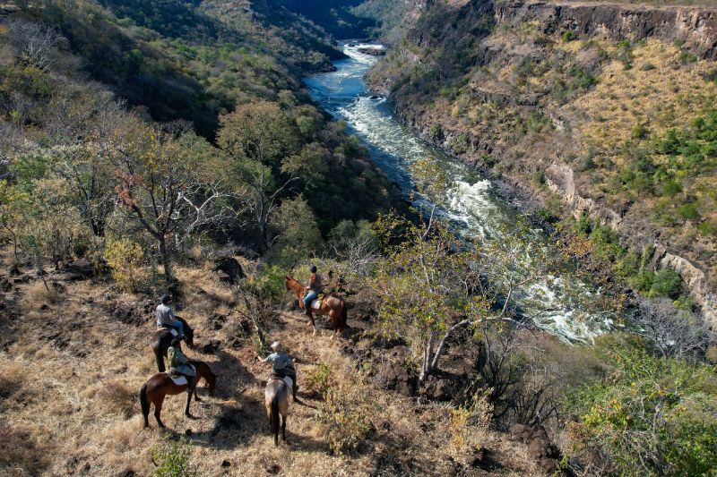 Horse riding along the edge of the gorge in Zimbabwe