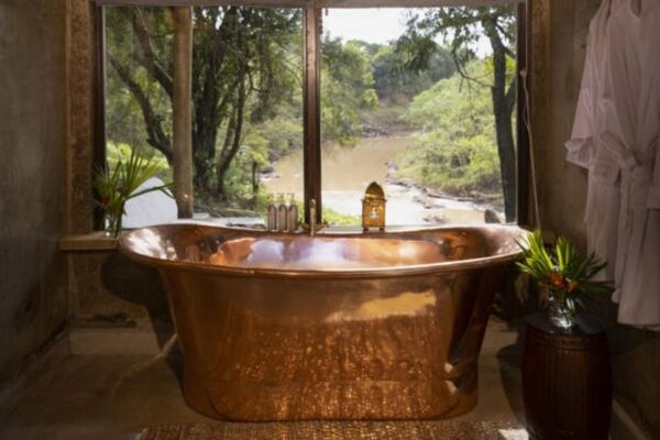 Copper bath in the Masai Mara at House in the Wild, Kenya